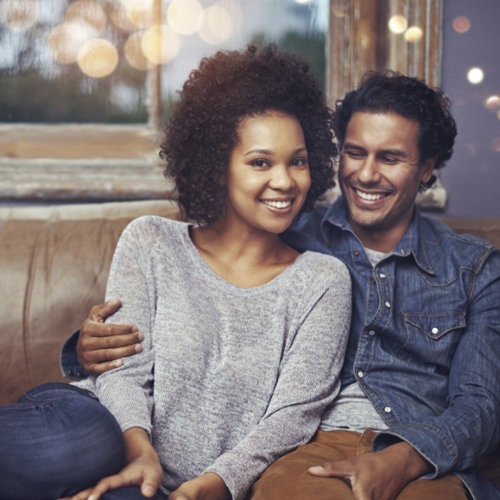 Man and woman sharing healthy smiles