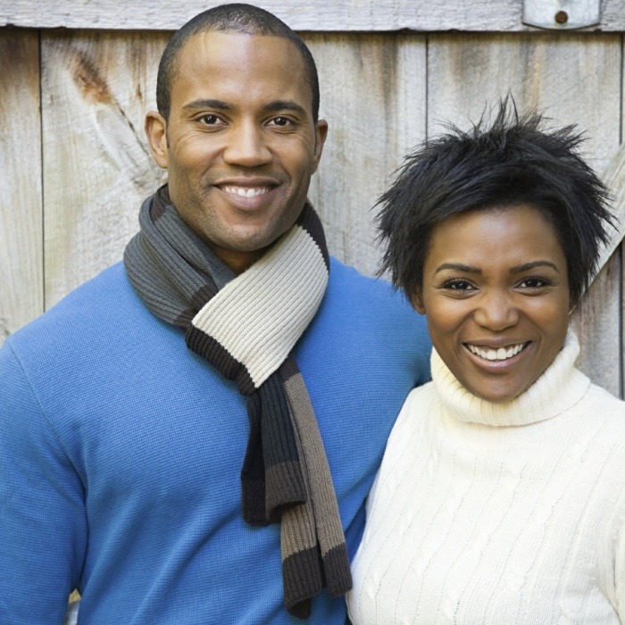 Man and woman with healthy smiles thanks to preventive dentistry in Waldorf Maryland